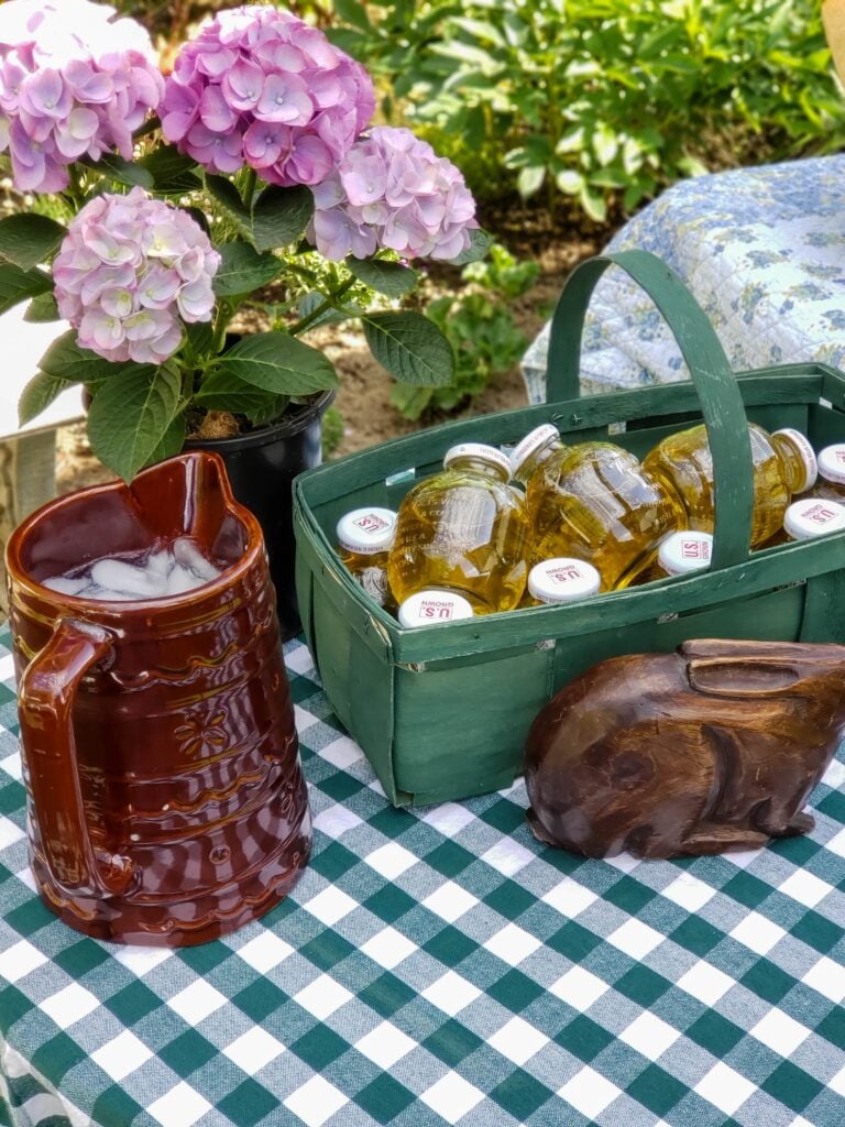 peter rabbit party juice bottles in basket and pitcher