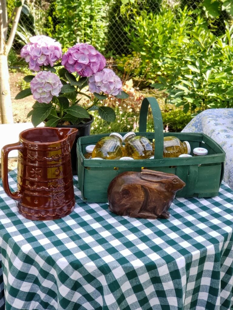 peter rabbit party juice bottles in basket and pitcher
