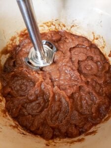 blending apple butter with immersion blender