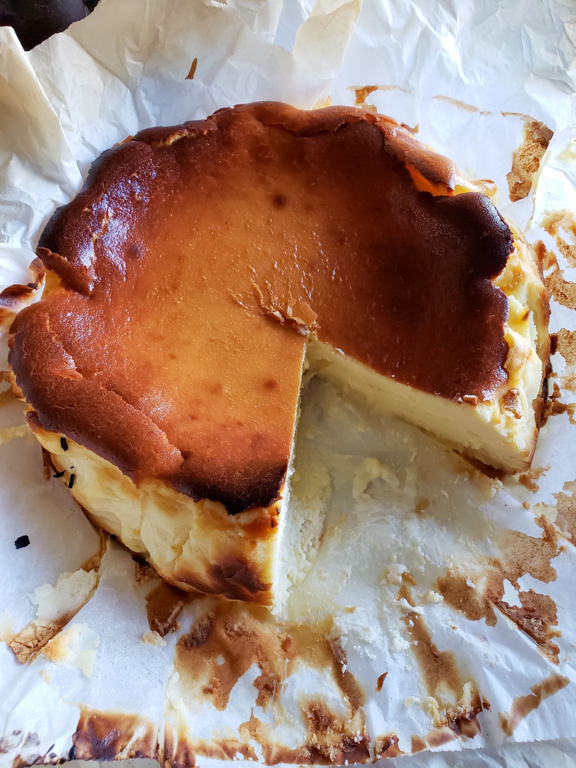 almond basque burnt cheesecake ON parchment paper