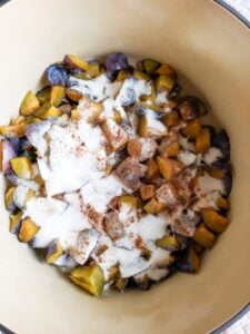 plum butter ingredients added to dutch oven