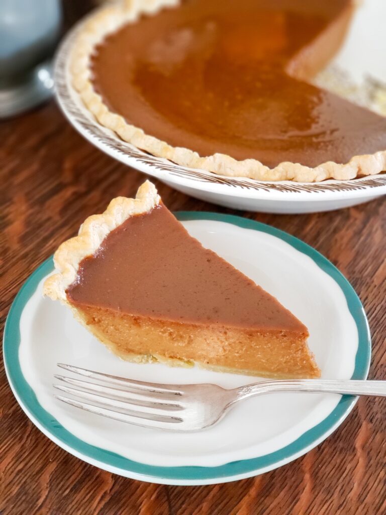old fashioned pumpkin pie slice on plate