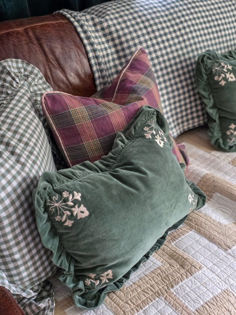 pillows in green and purple on couch