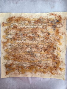 pastry sheet flat with ingredients on top