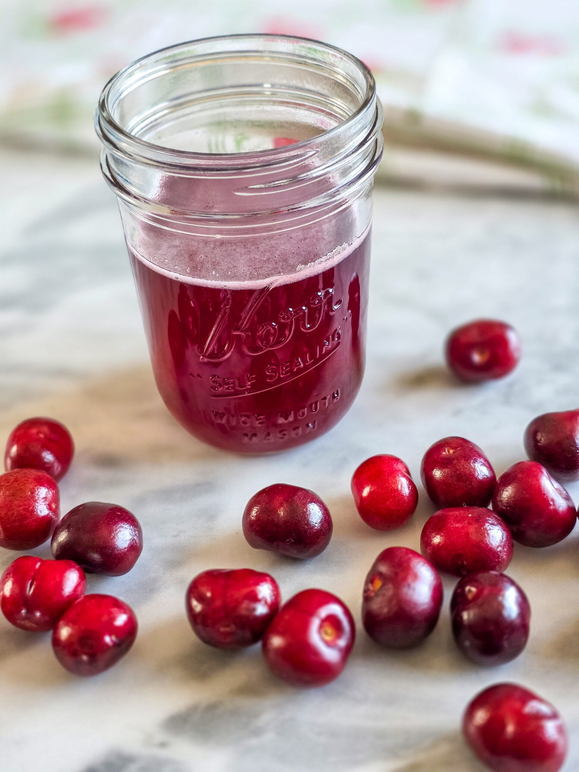 cherry simple syrup in a jar