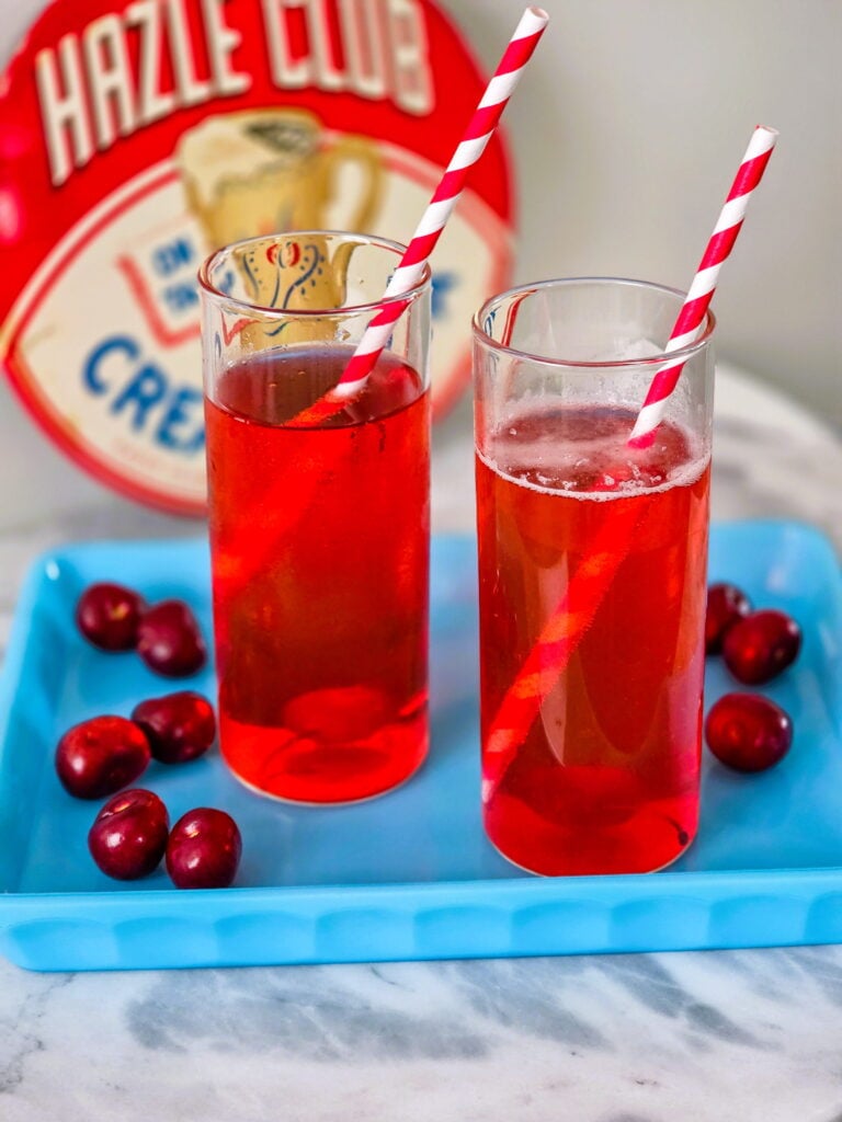 old-fashioned cherry phosphate soda recipe with blue tray and retro straws
