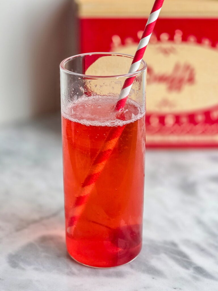 old-fashioned cherry phosphate recipe in tall glass with retro straws