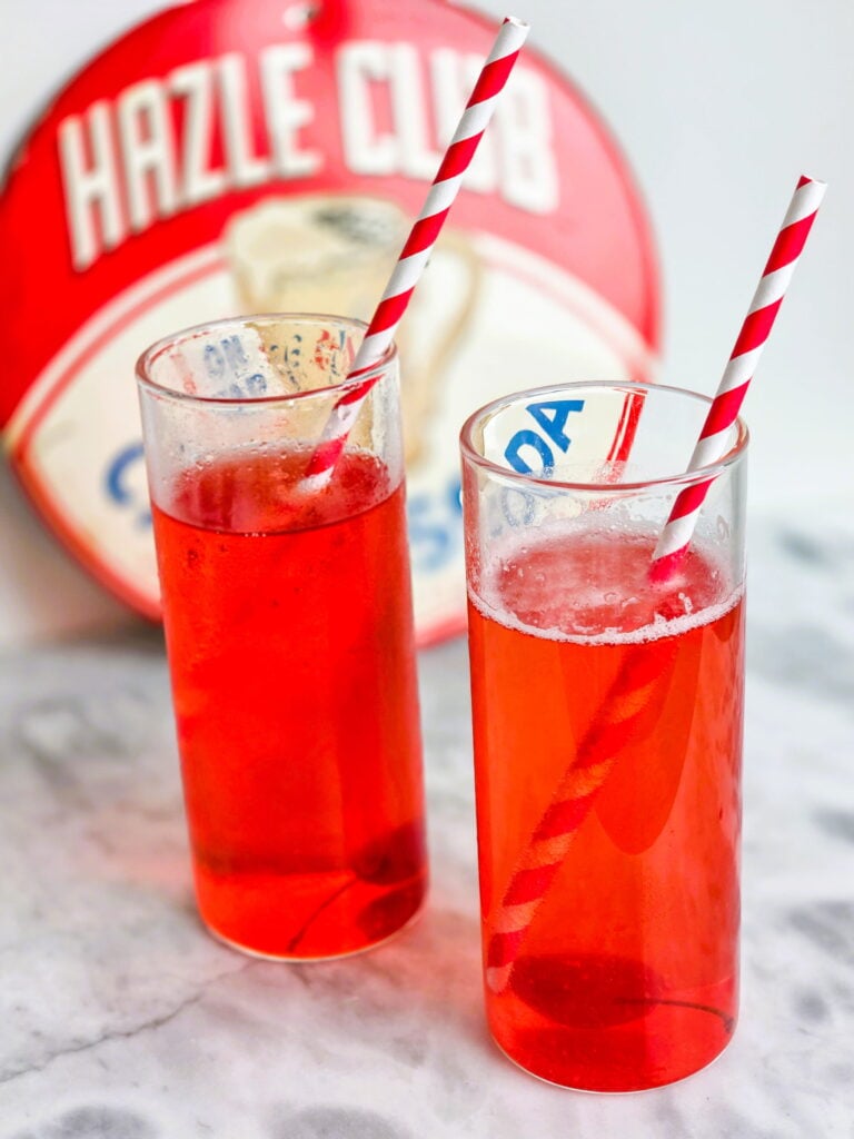 old-fashioned cherry phosphate soda in tall glass with retro straws