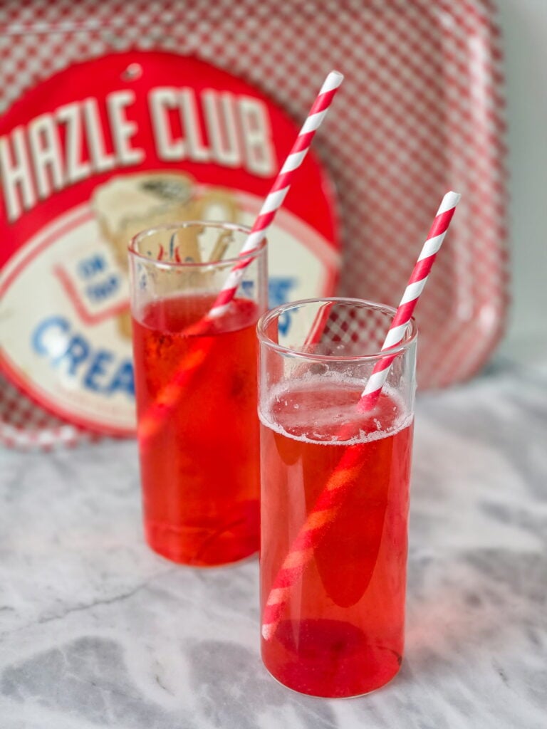 old-fashioned cherry phosphate soda in tall glass with retro straws