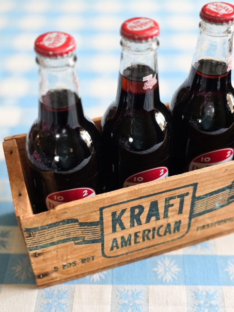 vintage summer gift basket ideas with thrifted americana charm: wood crate with sodas