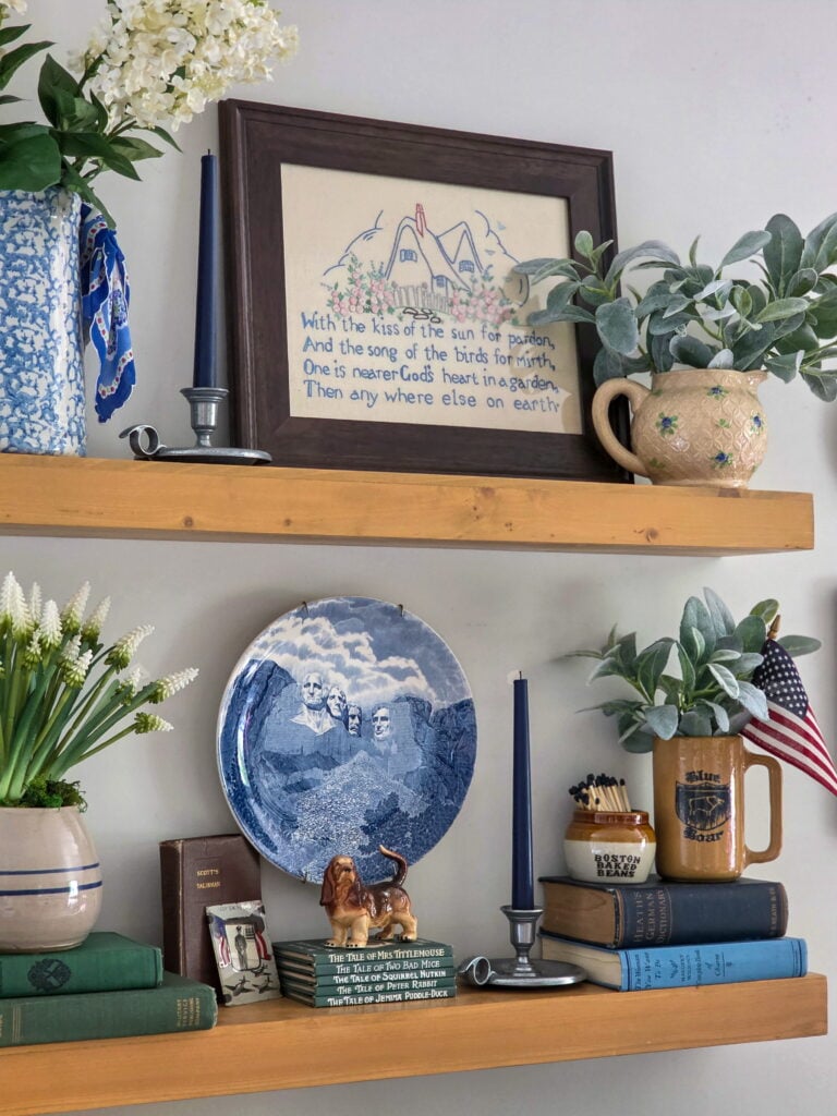 Vintage Cottage 4th of July Decor Ideas with Americana Charm featuring vintage crocks, baskets, gingham, and flowers