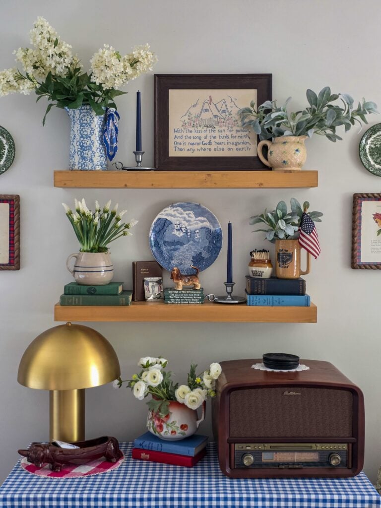 Vintage Cottage 4th of July Decor Ideas with Americana Charm featuring vintage crocks, baskets, gingham, and flowers