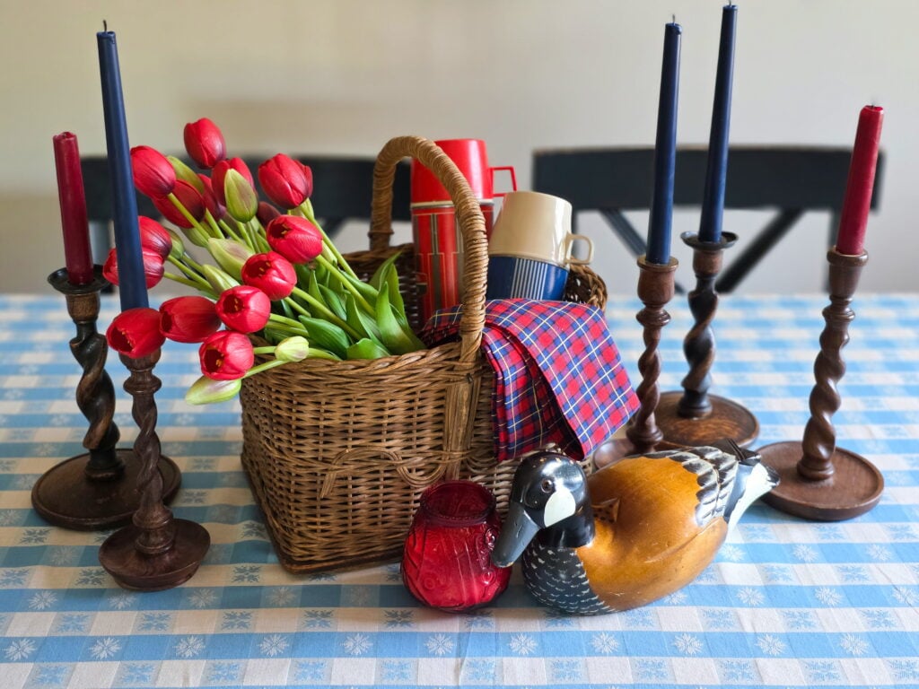 Vintage Cottage 4th of July Decor Ideas with Americana Charm featuring vintage crocks, baskets, gingham, and flowers