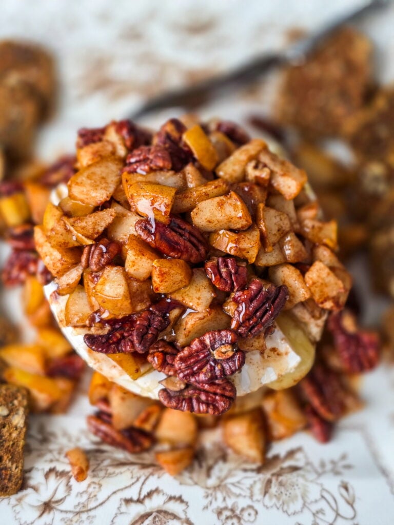 pear pecan baked brie on a vintage transferware platter