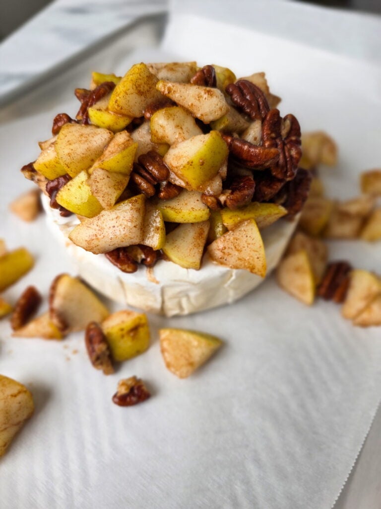 pear pecan baked brie ready for baking
